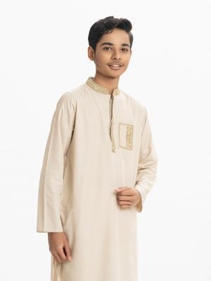 Teen Boys panjabi in cotton fabric. Mandarin collar, inseam pockets. Embroidery at collar, placket and pocket.