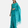 Women's traditional saree in cotton fabric. Embellished with weaving details and fringe trim at the achal.