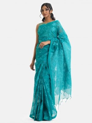 Women's traditional saree in cotton fabric. Embellished with weaving details and fringe trim at the achal.