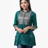 Exclusive printed tunic from Nargisus by Le Reve. Green tunic in silk & viscose blended fabric. Three-quarter sleeved, band neck and karchupi at the front.