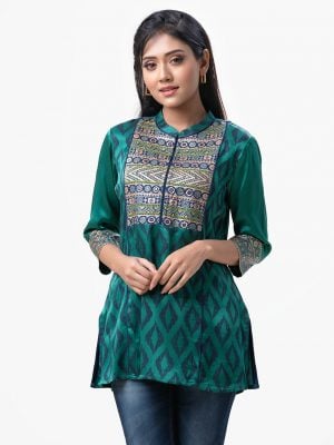 Exclusive printed tunic from Nargisus by Le Reve. Green tunic in silk & viscose blended fabric. Three-quarter sleeved, band neck and karchupi at the front.