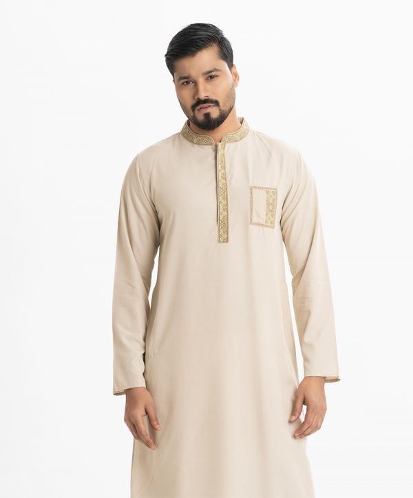 Mens printed in cotton fabric. Mandarin collar, inseam pockets. Embroidery at collar, placket and pocket.