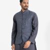 Men's Waistcoat in Jacquard fabric. Mandarin collar, sleeveless, straight hem with button closure and three pockets at front.