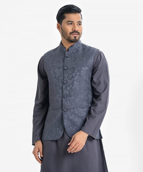 Men's Waistcoat in Jacquard fabric. Mandarin collar, sleeveless, straight hem with button closure and three pockets at front.