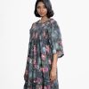 Women's flared style Maxi in blended cotton fabric. Frill trim neckline, kimono sleeves. Smoked on the chest and yoke with gathered waistline.
