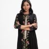Women's long shrug in viscose fabric. Band neck tied with a button, and karchupi at front and three quarter sleeves.