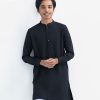 Teen boy's solid color short style panjabi in jacquard fabric. Mandarin collar with metal buttons on the placket.