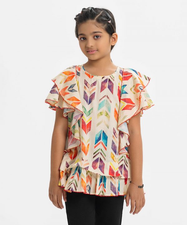 Multi-color printed tunic in cotton fabric. Round neck, ruffle sleeves and frill hem.