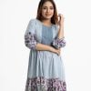 Women's frock style long tunic in joom fabric. Round neck and lantern sleeves. Lace attached at the front.