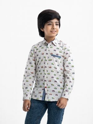 Kid boys vehicle printed long-sleeved shirt in cotton fabric. Classic collar and button fastening at the front.
