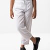 Kid's aligor pajama in cotton fabric. Two side pockets are at the side with an adjustable drawstring.