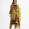 Women's paisley printed salwar kameez in joom fabric. Stand collar, three-quarter sleeves and karchupi at the front of kameez. Half-silk dupatta with pant pajamas.
