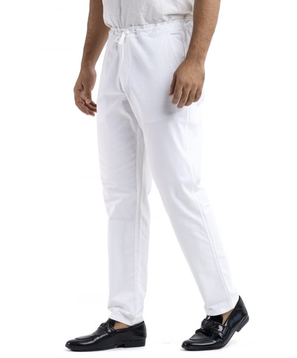 Men's pant pajama in blended cotton fabric. Two zippers fly side pockets with adjustable knots and two back pockets.