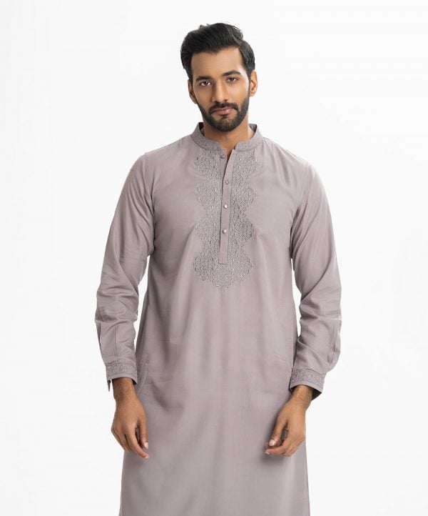 Men's semi fitted panjabi in cotton fabric. Mandarin collar, inseam pockets. and embroidery at the top front.
