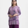 Printed ladies shirt in joom fabric. Stand collar, three-quarter sleeved. Karchupi and button fastening at the front.