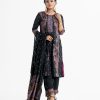 Women's printed Salwar Kameez in crepe fabric. Round neck, three-quarter sleeves and karchupi at the front of kameez. Half-silk dupatta with pant pajamas.