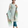 Women's printed salwar kameez in joom fabric. Three-quarter sleeves, boat neck kameez with karchupi at front. Half-silk dupatta with pant-style pajamas.