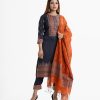 Women's printed Salwar Kameez in crepe fabric. Boat neck, three-quarter sleeves and karchupi at the front of kameez. Half-silk dupatta with pant pajamas.