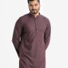 Men's slim fitted panjabi in jacquard fabric. Mandarin collar, full-sleeved. Inseam pockets and button fastening at the front.