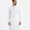 Men's semi-fitted panjabi in cotton fabric.Mandarin collar and inseam pockets. Embroidery and karchupi at the front.