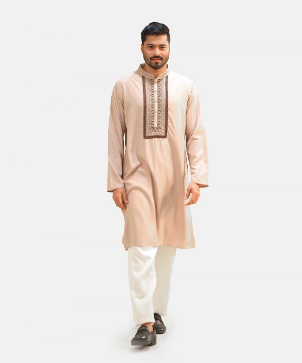 Men's solid color premium panjabi in cotton fabric. Mandarin collar and inseam pockets. Embroidery at the front.