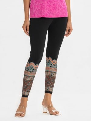 Women's leggings in cotton knit fabric. Concealed elasticated on the waistline.