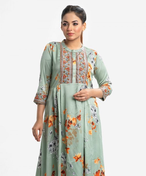 Women's A-line long tunic in floral printed georgette fabric. Stand collar, three-quarter sleeves. Karchupi at front and sleeves.