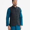 Men's Waistcoat in Jacquard fabric. Mandarin collar, sleeveless, straight hem with button closure and three pockets at front.