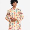 Teen boys panjabi in printed cotton fabric. Mandarin collar and inseam pockets.