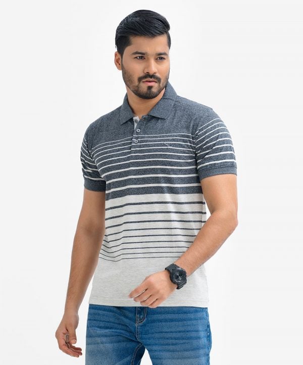 Men's stripes polo shirt in mercerized cotton fabric. Classic collar with button placket and short sleeves.