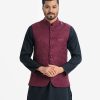 Men's Waistcoat in Jacquard fabric. Mandarin collar, sleeveless, straight hem with button fastening and three pockets at front.