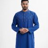 Men's premium panjabi in jacquard fabric. Mandarin collar, inseam pockets and karchupi at the front.