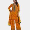 Women's printed salwar kameez in crepe fabric. Round neck, three-quarter sleeved and karchupi at the front. Complemented with crepe palazzo pants with karchupi at hemline and chiffon dupatta.