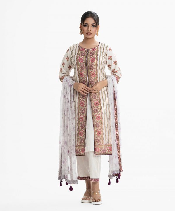 Women's printed shrug style salwar kameez in muslin and crepe fabric from Nargisus by Le Reve. Round neck, three-quarter sleeved and karchupi at the front. Complemented with crepe palazzo and chiffon dupatta with tassel tie.