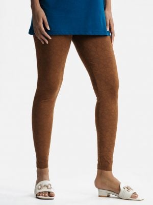 Women's leggings in stretchable cotton knit fabric. Concealed elasticated waistline and all over printed.
