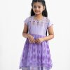 Kid girls printed frock in viscose fabric with chiffon fabric patch attached at waistline. Cap sleeves, round neck and tie-cord at back.