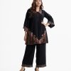 Women's printed A-line top bottom set in viscose fabric. Classic collar, long sleeves with palazzo pants.
