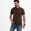 Men's printed short-sleeved polo in cotton pique fabric. Classic collar with straight hem.