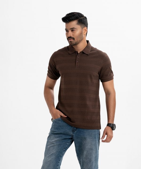 Men's printed short-sleeved polo in cotton pique fabric. Classic collar with straight hem.