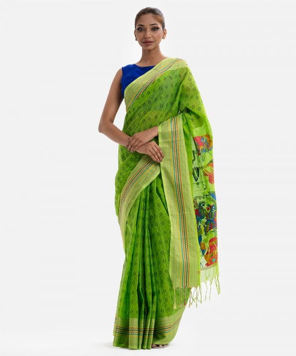 Women's ethnic themed cotton saree with weaving details.