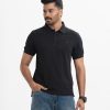 Mens short sleeved polo in bubble knit fabric. Classic collar and button fastening at the front.