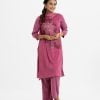 Women's printed straight salwar kameez in joom fabric. Round neck, three-quarter sleeves and karchupi at the front. Paired with a joom palazzo pant and a chiffon dupatta.