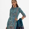 Women's printed straight salwar kameez in joom fabric. Stand collar, three-quarter sleeves. Karchupi at the front. Paired with a crepe palazzo pant and a half-silk dupatta.