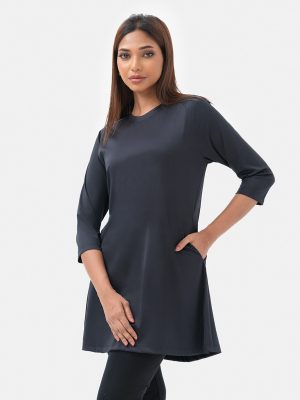 Women's A-line tunic in dri fit fabric. Wrangler sleeves and crew neck.
