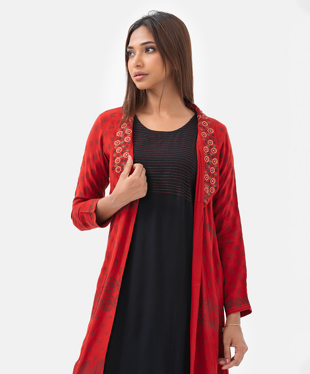 Women's A-line tunic with shrug in silk & viscose blended fabric. The shrug features three-quarter sleeves, shawl collar with karchupi details. Paired with an attached viscose tunic. Women's A-line tunic with shrug in silk & viscose blended fabric. The shrug features three-quarter sleeves, shawl collar with karchupi details. Paired with an attached viscose tunic.