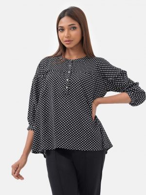 Women's pulka dot printed tent-style top in georgette fabric. Stand collar, bishop sleeves and button fastening at the front.