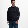 Four-pocket shacket in Black Blended Nylon fabric. Classic collar, full sleeves with adjustable buttons.