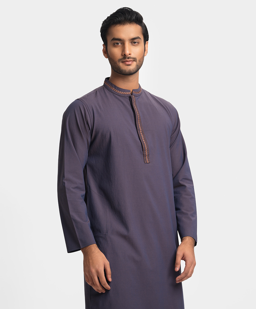 Fitted panjabi in blended jacquard fabric. Embroidery on the collar and hidden button placket. Inseam side pockets. Purple Blended Jacquard Fitted Panjabi
