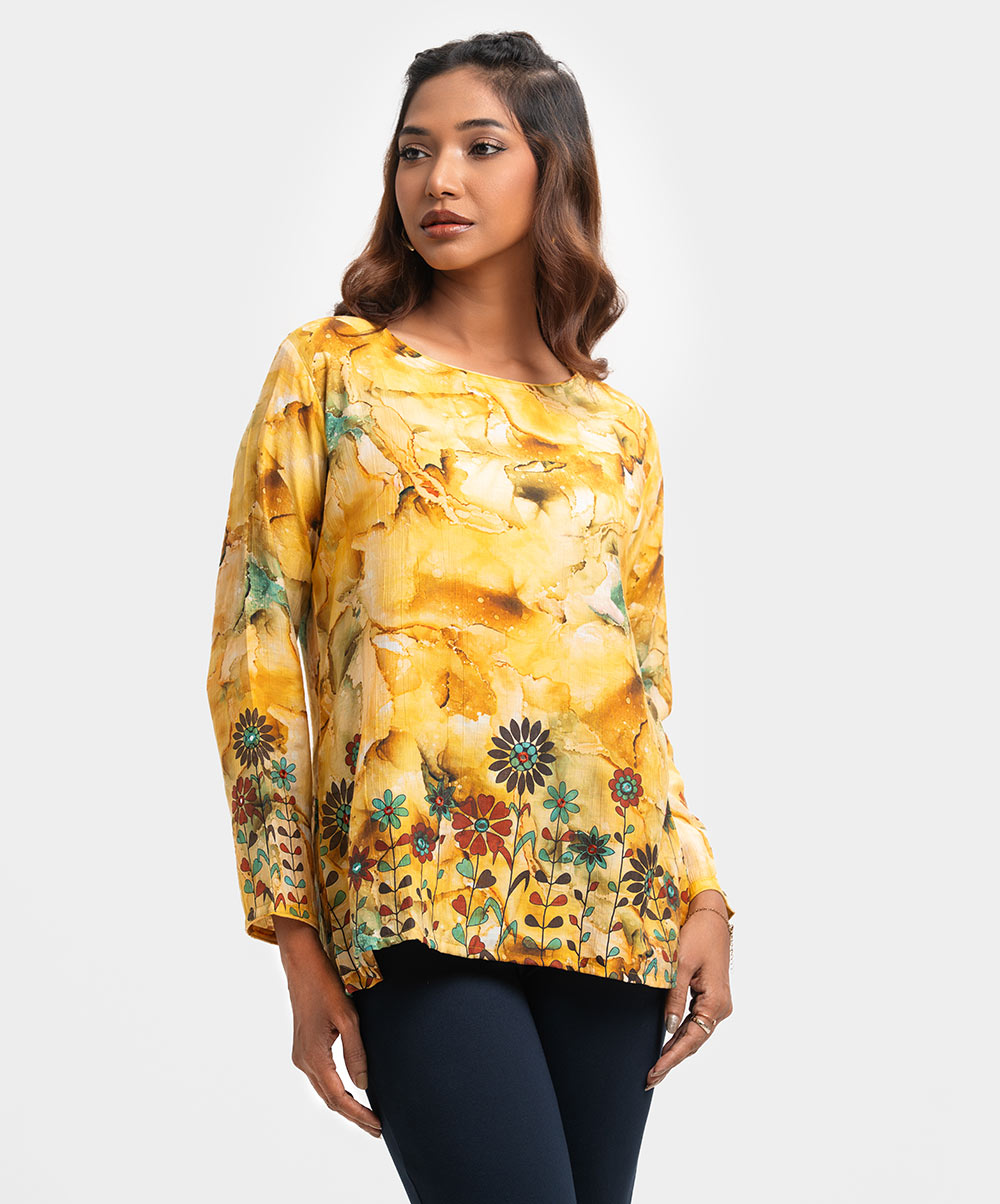 Women's A-line woven short top in printed blended cotton fabric. Boat neck, full sleeves. Karchupi at sleeves & hemline. Yellow Cotton A-line Woven Top