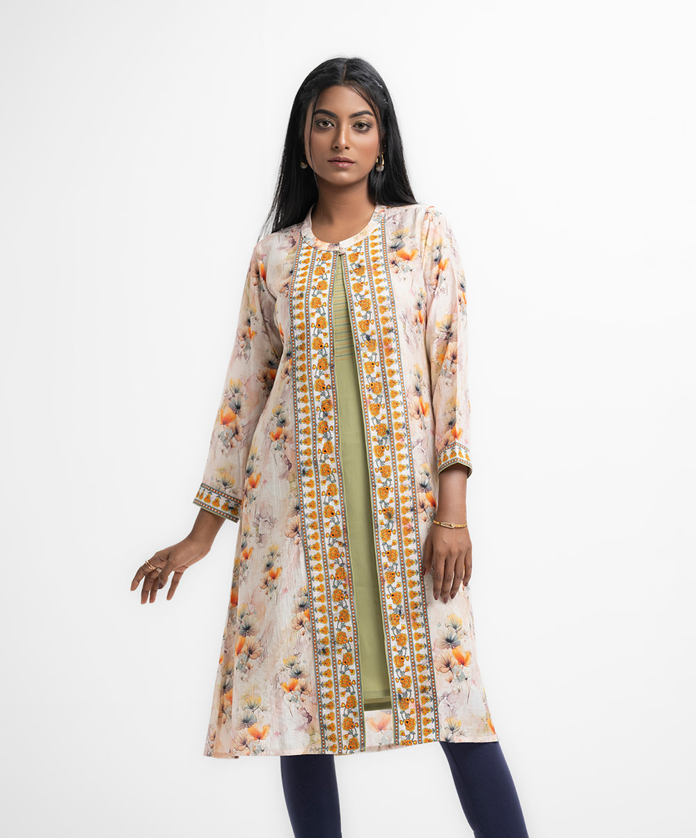 Front single button opening, three-quarter sleeved, floral printed blended cotton shrug with attached tunic. Karchupi at the front. Printed Cotton Tunic With Shrug